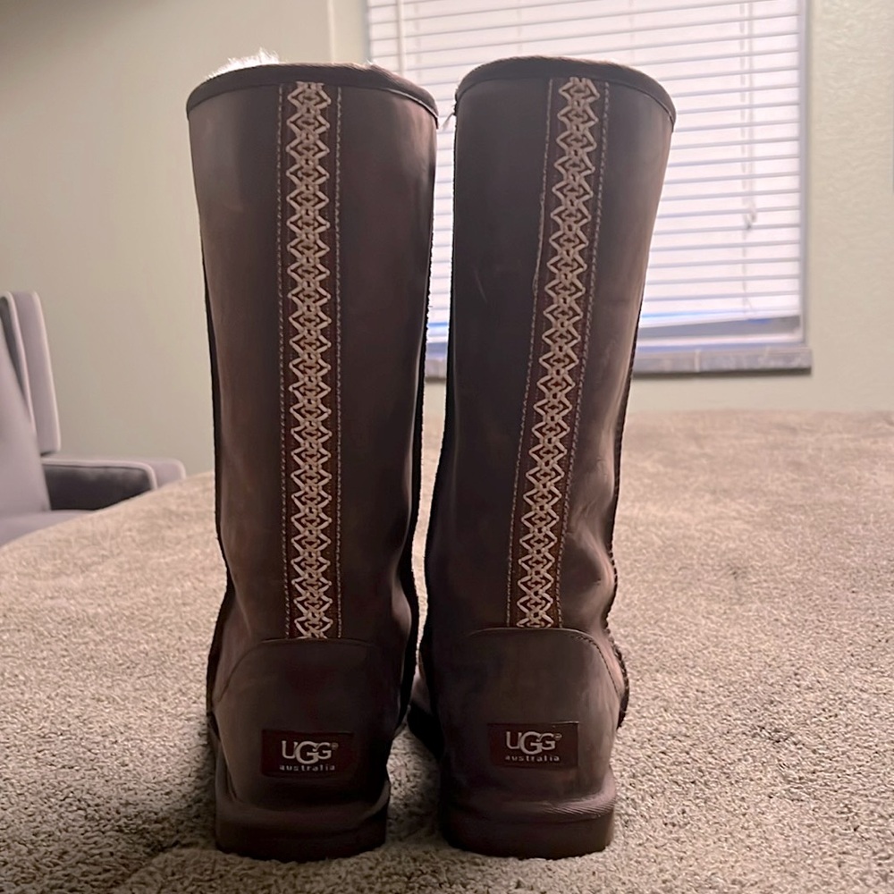 Tall dark brown Ugg boots with embroidered stitching up the back, size 8